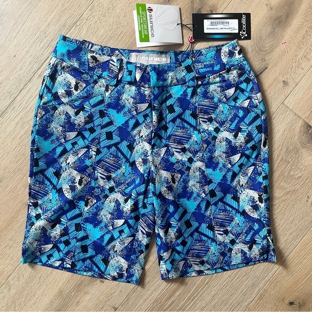 Sunice woman’s coollite golf Samantha 9”shorts violet blue flash print Sz 2 *E19